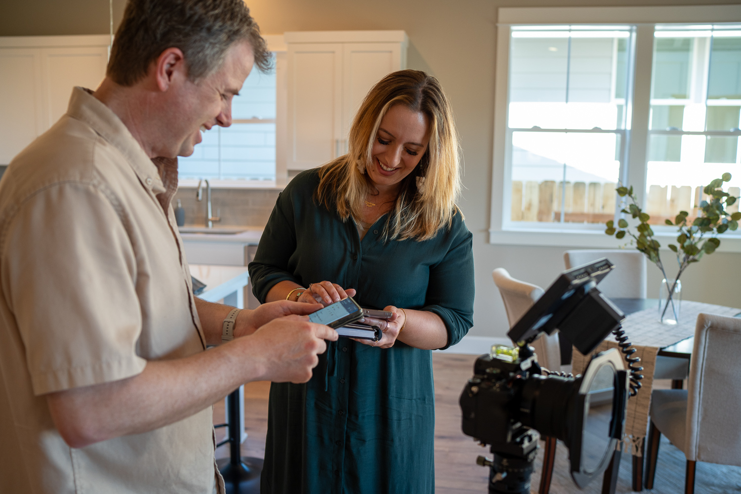 Scott Kemp at Realiant Photography helping a Realtor with her new listing.